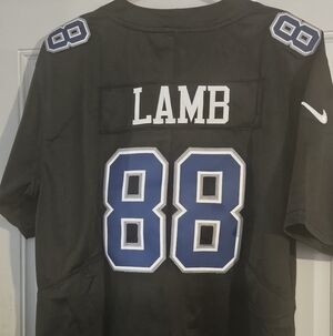 Dallas CowboysBlack Jersey with Blue and White Numbering